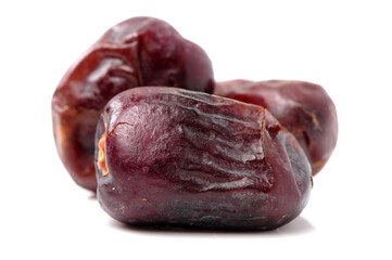medjool dates on white background.