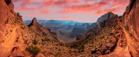 Panoramic of the beautiful descent of the South Kaibab Trailhead with a mountain in the background. Grand Canyon, Arizona