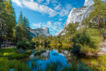 Fototapeta na wymiar Reflections in the water of the Yosemite Mountains in Mirror lake, Yosemite. California, United States