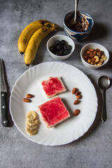 Breakfast food ingredients on  background. Concept of delicious and healthy food. View from above.