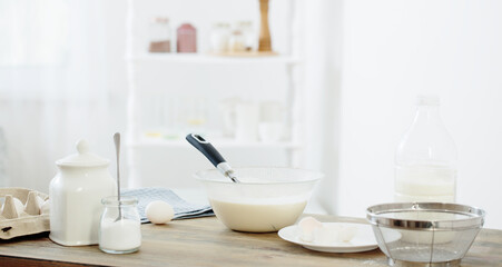 batter on wooden table in  white kitchen