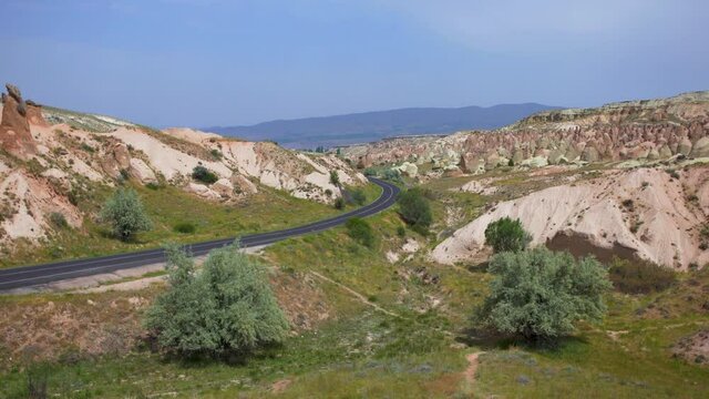 4k stock video footage of empty road in scenic turkish Cappadocia. Devrent Valley (Imagination Valley), Turkey, Anatolia