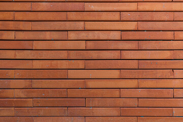 Red brick wall. Texture of old dark brown and red brick wall background.