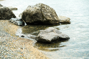 Mountain textures, stone, water. Beautiful background. Clay quarry. Beautiful landscapes.