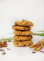 composition of dietary chocolate chip cookies on a white background. sports sweet and healthy food