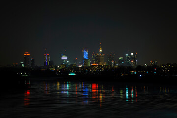Fototapeta na wymiar Warsaw seen from Siekierkowski bridge at night