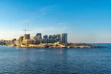 Tigne Point is the end tip of Sliema, Malta. It is a mixture of modern apartments and historic buildings.