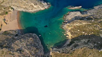 Aerial drone photo of winding road leading to iconic paradise beach of Melidoni, Kythera island,...