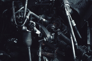 Fototapeta na wymiar Car motor parts. Auto motor mechanic spare or automotive piece on dark background