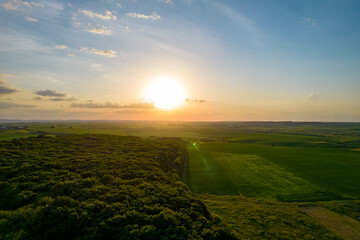 Aerial view of the sunset over the field