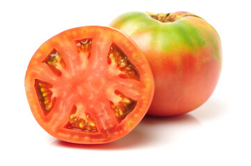 Red fresh tomato on white background