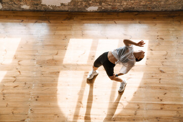 Young brunette white woman dancing contemporary