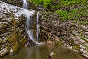 Fototapeta premium Beautiful waterfalls and mountain rivers in Schoenebach in Vorarlberg, Austria