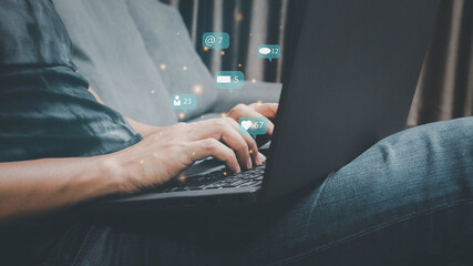 Young man using laptop(Notebook),Social media concept. Social in every day lifes.Freelance man using laptop computer for marketing online.