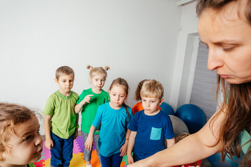 Teacher gives hula-hoops to group of impatient ids