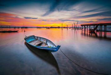 boat at sunset in batam island 