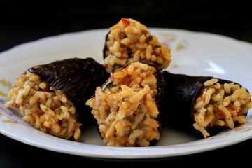 Stuffed aubergines in a white plate