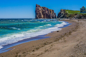 View on Percé Rock and Cape Mont Joli from the North cove beach in Gaspesie (Quebec, Canada)