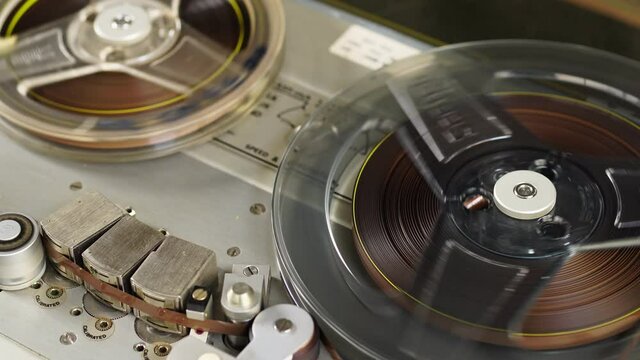Old vintage reel-to-reel player. Tape recorder with spools. Bobbin tape recorder.	