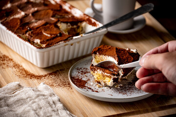 Italian dessert Tiramisu and espresso coffee.