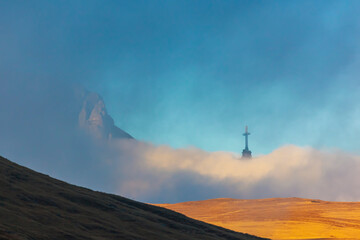 Caraiman Mountain Cross sunset, in Bucegi Mountains, Romania