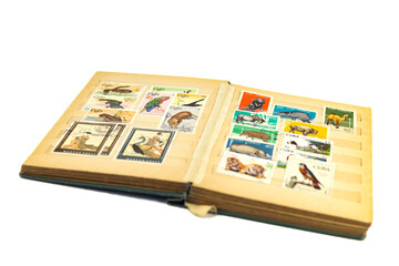 Vintage post stamp album with postage stamps