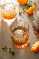 Whiskey, brandy or bourbon alcohol drink in crystal glasses