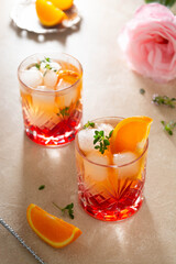 Summer drink with strawberries, oranges and fresh herb, delicious homemade lemonade with syrop