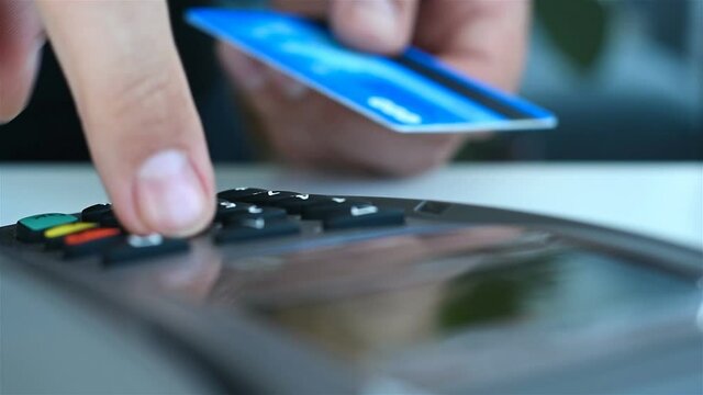 Customer Using Credit Card To Pay. Electronic Money And Shopping Concept. Close Up