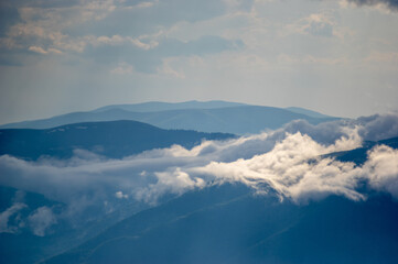 Fog on a mountain range in the Carpathian mountains
