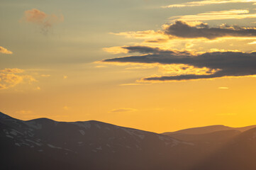 Beautiful orange sky during dusk in the carpathian mountains