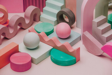 Assortment of wooden geometric figures in pastel colours