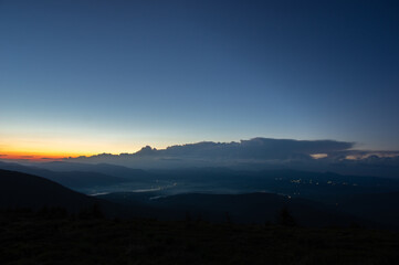 Beautiful orange sky during dusk in the carpathian mountains