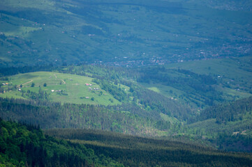 Fototapeta na wymiar Beautiful landscape of mountain ranges and forests in the Ukrainian carpathians