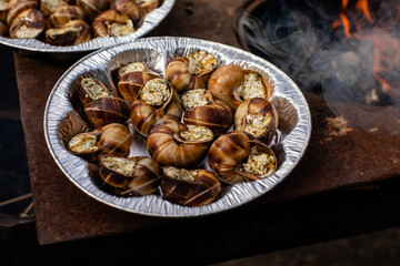 Catalan food. Snails from the barbecue, in Catalan Cargols a la Llauna