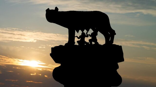 Capitoline Wolf ( Lupa Capitolina) Symbol Of Rome, Time Lapse at Sunrise with Colorful Clouds, Italy