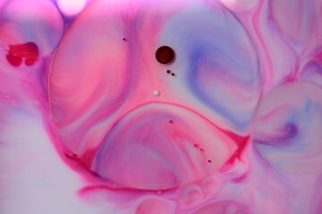 Abstract colors, backgrounds and textures. Food Coloring in milk. Food coloring in milk creating bright colorful abstract backgrounds. Colorful chemical experiment.