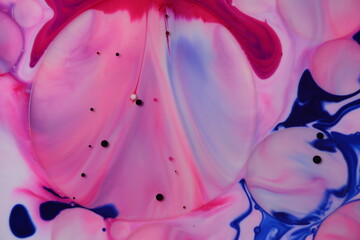 Abstract colors, backgrounds and textures. Food Coloring in milk. Food coloring in milk creating bright colorful abstract backgrounds. Colorful chemical experiment.