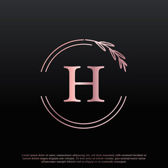 Elegant H Letter Circle Floral Logo with Creative Elegant Leaf Monogram Branch Line and Pink Black Color. Usable for Business, Fashion, Cosmetics, Spa, Science, Medical and Nature Logos.