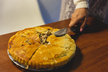 Homemade meat pie on the kitchen table
