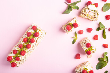 Dessert pistachio roll with raspberry filling. Food photo with space for text, concept of sweets, menu for cafe.