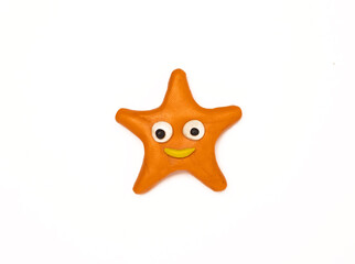 plasticine starfish on a white background