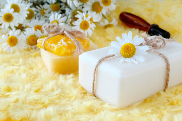 Obraz na płótnie Canvas Natural, herbal, chamomile soap. Sauna, spa concept. Beauty and health. Cosmetic products