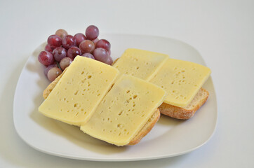 Two Cheese sandwiches with Grapes 