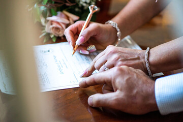 Signing marriage license 