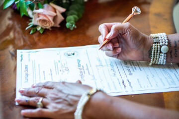 Signing marriage license 