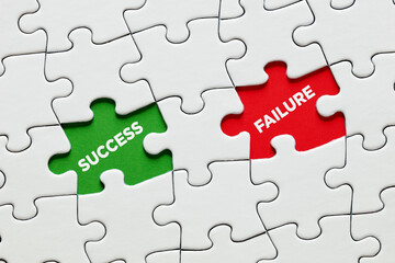 Fototapeta premium Missing puzzle pieces with the words success versus failure. To succeed or fail in education, business or career