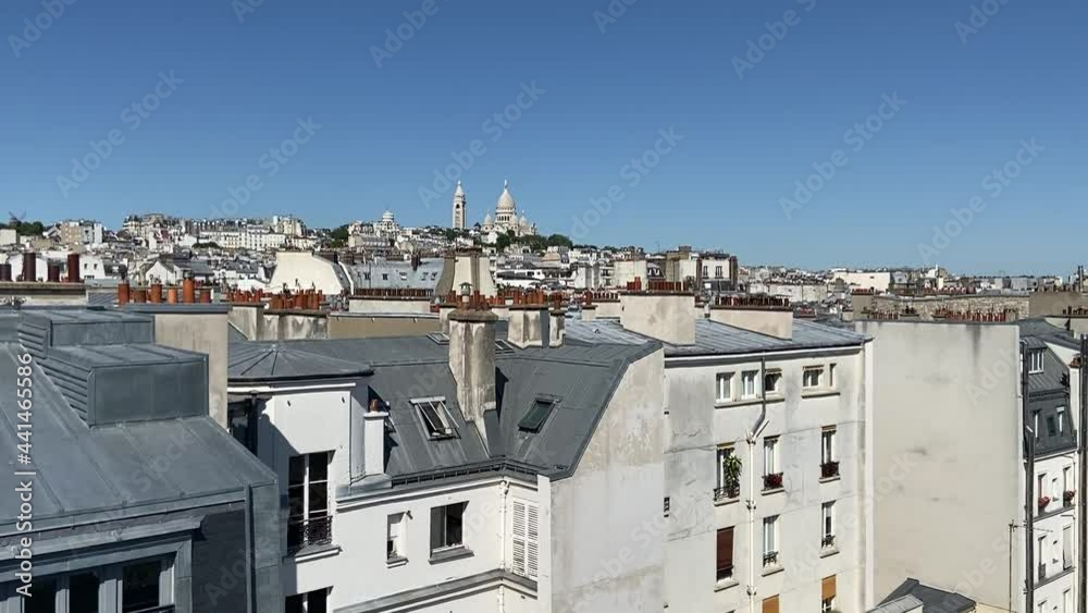 Sticker Paysage urbain à Paris, vue d'un toit d'immeuble