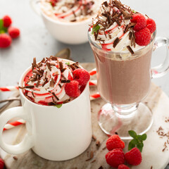 Summer hot chocolate with whipped cream and raspberry syrup
