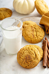 Pumpkin snickerdoodle cookies with cinnamon and milk